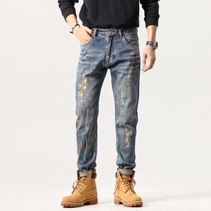 Jean slim pour homme avec taches de peinture colorées et style moto au design délavé