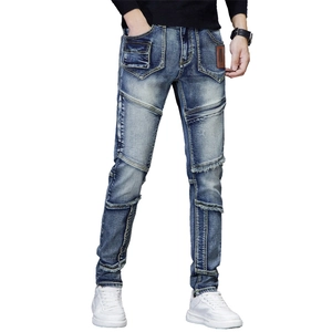 Jean slim pour homme avec patchs vintage et patchwork dans un délavage bleu foncé