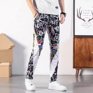 Men's slim fit stretch denim jeans with vibrant graffiti print and white side stripes