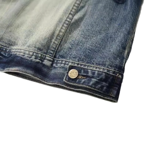 Classic washed blue denim jacket for men featuring vintage metal buttons and contrast stitching