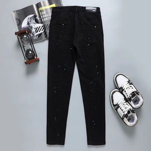 Jean noir slim pour homme avec éclaboussures de peinture bleue et blanche style urbain