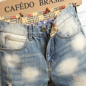 Vintage light blue washed straight leg jeans for men with high street retro aesthetic style