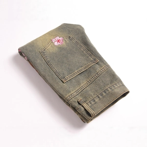 Retro washed stretch flared jeans for men featuring pink cherry blossom embroidery