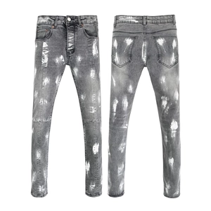 Front and back view of grey slim fit jeans with white hand-painted paint splatter details