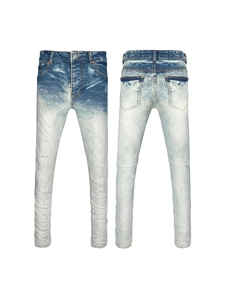 Men's slim fit heavy-washed jeans with blue-white gradient and distressed ripped details