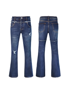 Slim fit retro blue flared jeans for men with distressed details and frayed patchwork