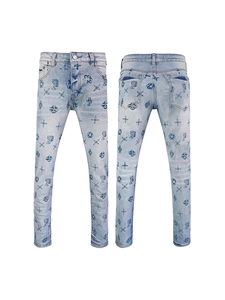 Men's slim-fit light blue washed jeans with gothic star print and full-body pattern
