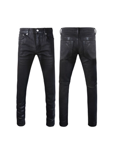 Men's slim fit black coated denim jeans with premium heavy wash ink splatter effect