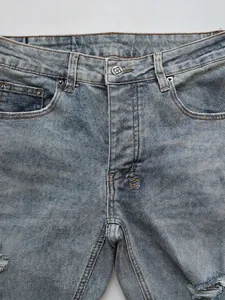 Light blue vintage wash flared jeans for men with golden W-shaped contrast stitching