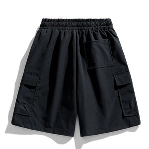 Detail view of black cargo shorts featuring elastic drawstring waist and side flap pockets