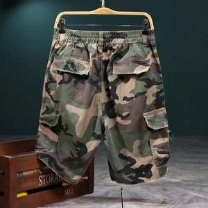 Loose fit men's camouflage cargo shorts with multi-pockets and elastic waist design