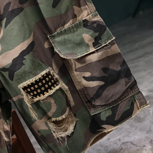 Men's camouflage cargo shorts with vintage distressed holes and gold rivet detailing