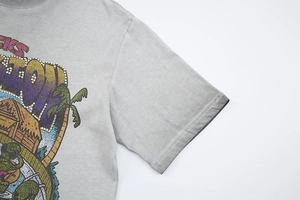 Close-up detail of American retro style print on grey washed vintage cotton T-shirt