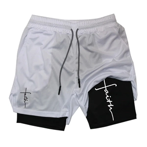 Detail view of double-layer sports shorts with white mesh fabric and faith print