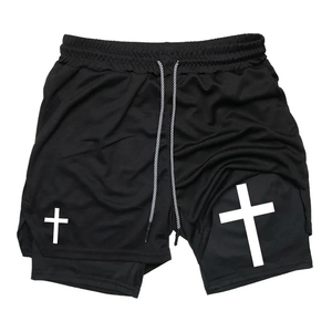 Detail of double-layer sports shorts featuring mesh fabric and white cross prints