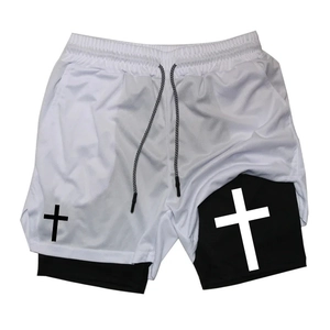 Detail of breathable white mesh layer and black compression lining with cross prints