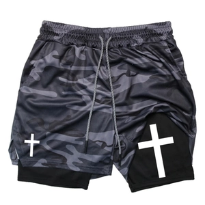 Detail of gray camouflage double-layer sports shorts with white cross print and drawstring