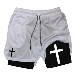 Detail view of men's double-layer sports shorts with mesh fabric and cross logo