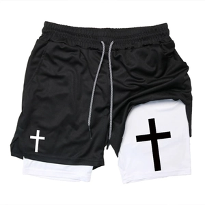 Detail of double-layer men's sports shorts with towel loop and cross print