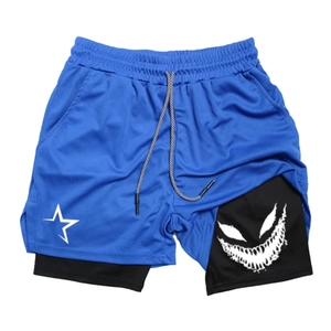 Detail of blue mesh workout shorts featuring star print and monster smile lining
