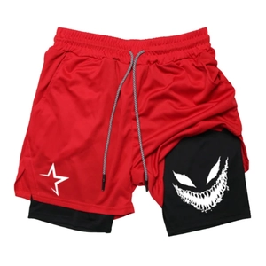 Detail of red 2-in-1 men's shorts with white star logo and printed inner compression liner