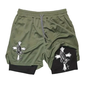 Detail of 2-in-1 sports shorts in army green mesh with black inner layer and prayer hand print