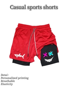 Detail der roten 2-in-1-Shorts mit Shark-Print und bunter Smiley-Innenlage für Sport