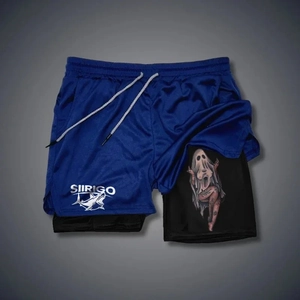 Detail view of 2-in-1 men's sports shorts with artistic graphic print on black inner layer