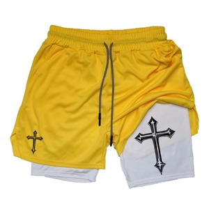 Detail of 2-in-1 yellow mesh running shorts with gothic cross print and drawstring