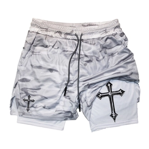 Detail of 2-in-1 camo sports shorts showing white compression liner and cross print
