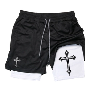 Detail view of 2-in-1 sports shorts showing gothic cross print and mesh fabric