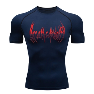 Detail of red graphic print and crew neck on navy blue compression sports t-shirt
