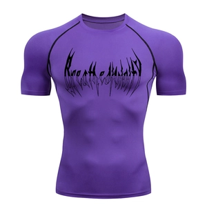 Macro shot of purple compression shirt featuring flatlock black seams and breathable fabric