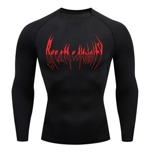 Macro detail of black long sleeve compression shirt with red artistic chest print