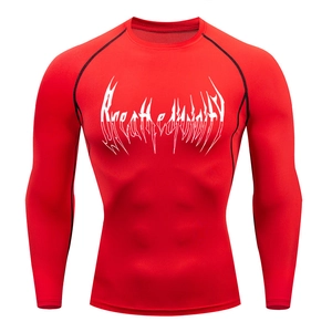 Detailed view of red compression long sleeve shirt with white gothic chest print