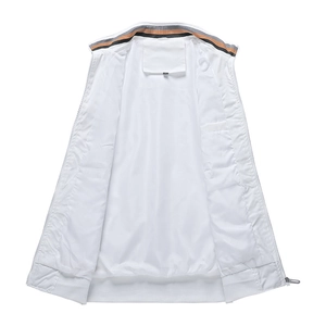 Detail of white sleeveless vest featuring striped collar lining and interior pocket