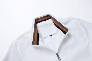 Close-up of white sport jacket collar featuring tricolor striped tape and size L tag