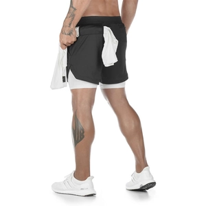 Men's double-layer compression running shorts with side slit and back towel loop detail
