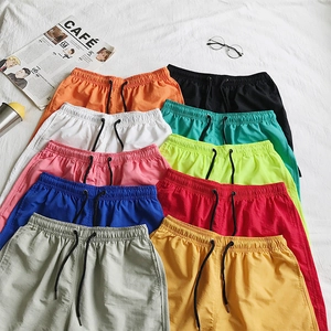 Men's quick-dry casual drawstring shorts in ten vibrant colors for beach and sports
