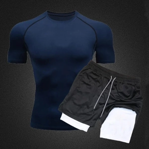Detail of men's quick-dry sports set with navy compression shirt and 2-in-1 black shorts