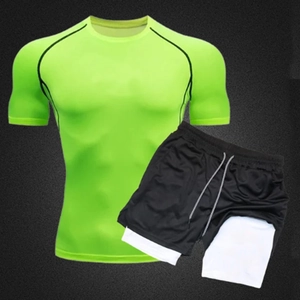 Detail of double-layer swim trunks with drawstring and neon green compression t-shirt