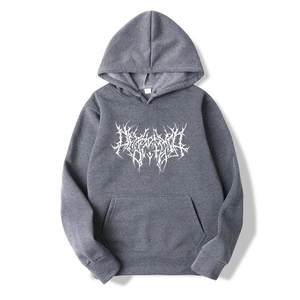 Detail shot of the white death metal font print on a dark gray gothic oversized hoodie