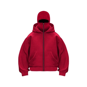 Detail of red oversized hoodie featuring an integrated balaclava face mask and zipper