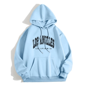Light blue oversized hoodie with Los Angeles lettering and kangaroo pocket in casual style