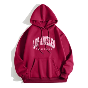 Detail view of burgundy hoodie featuring Los Angeles arch letter print and kangaroo pocket
