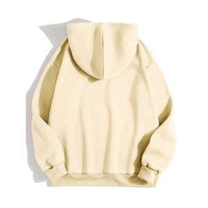 Rear view of beige oversized hoodie showing drop shoulder design and ribbed cuffs detail