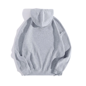 Back view of light grey oversized hoodie showing drop shoulder seams and ribbed hem details