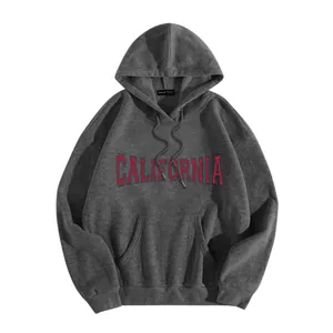 Close-up of charcoal grey hoodie with California vintage varsity lettering and kangaroo pocket