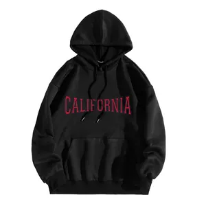 Detail of red California letter print on black hooded sweatshirt with kangaroo pocket