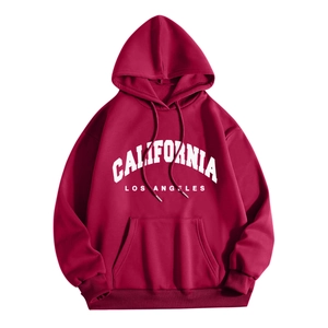 Detail of burgundy hoodie featuring California Los Angeles white lettering and kangaroo pocket